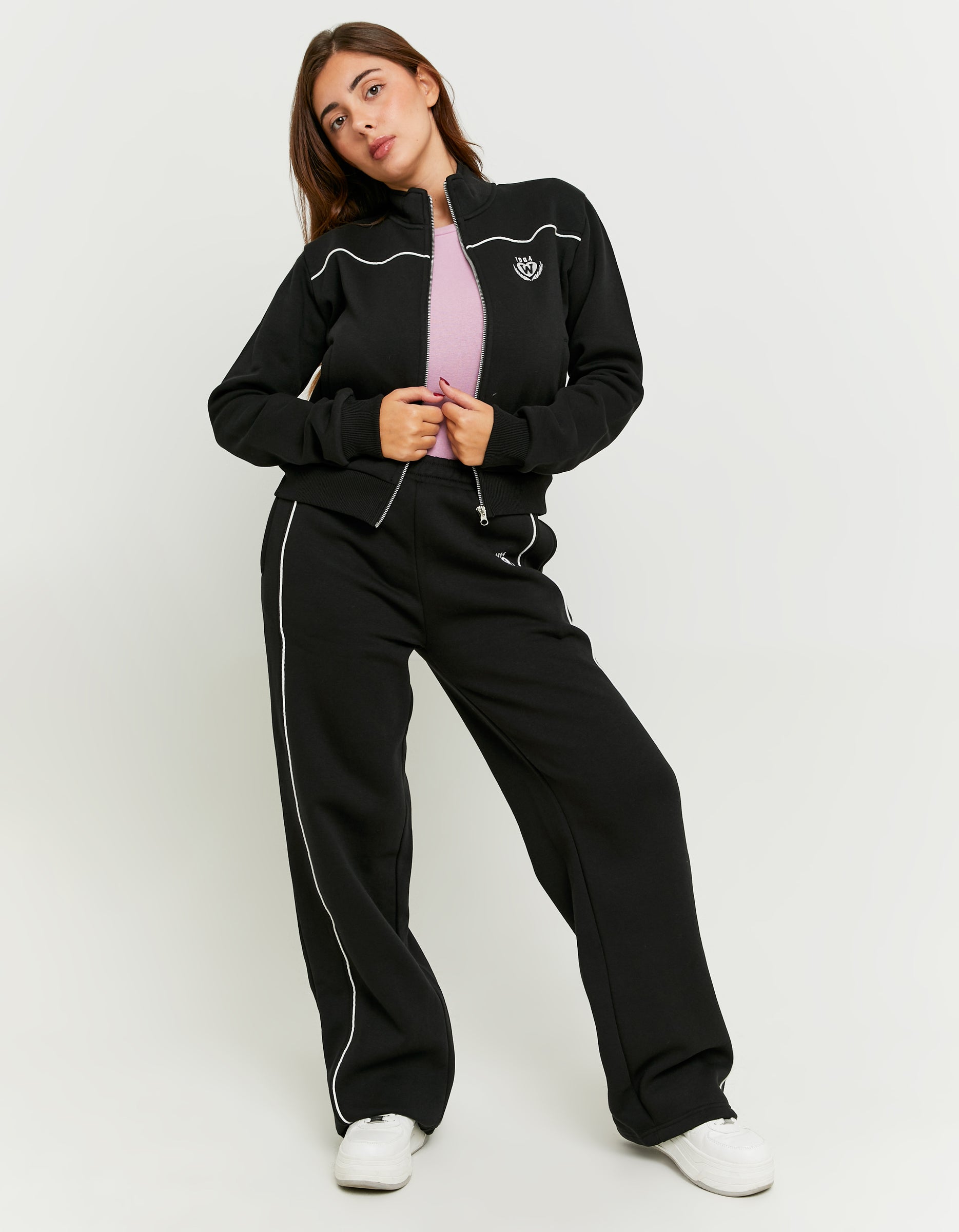 Ladies Black Joggers With Embroidery And Bands Detail-Model 1 Full Front View