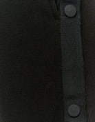 Close-up detail of the black wide leg joggers fabric