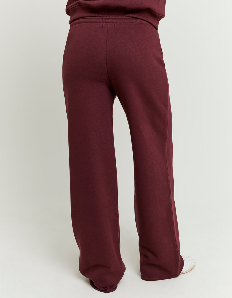 Ladies Burgundy Jogging Pants-Model Full Length Back View