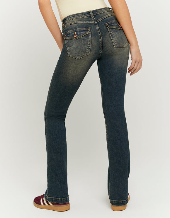 Tally Weijl blue mid waist bootcut jeans worn by model, back view