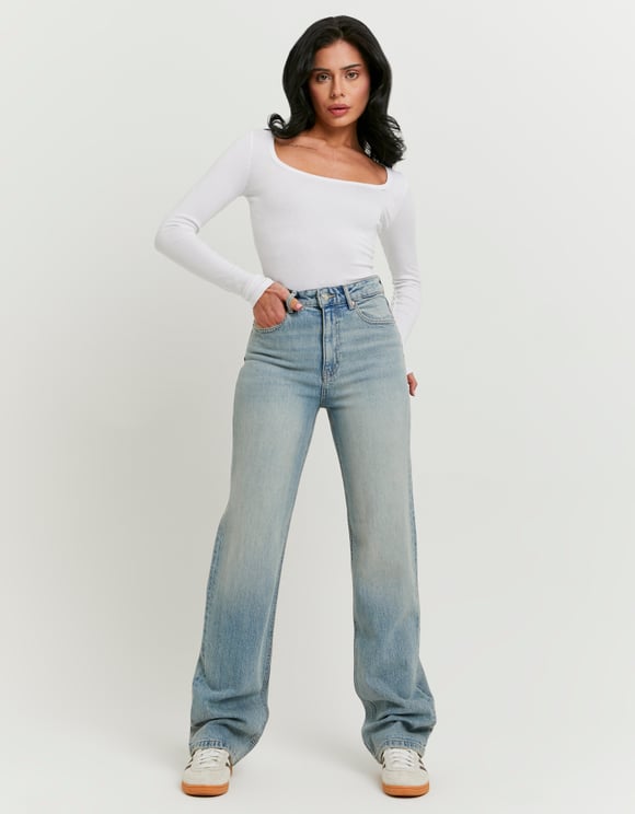 Tally Weijl light blue high waist straight leg jeans worn by model, front view