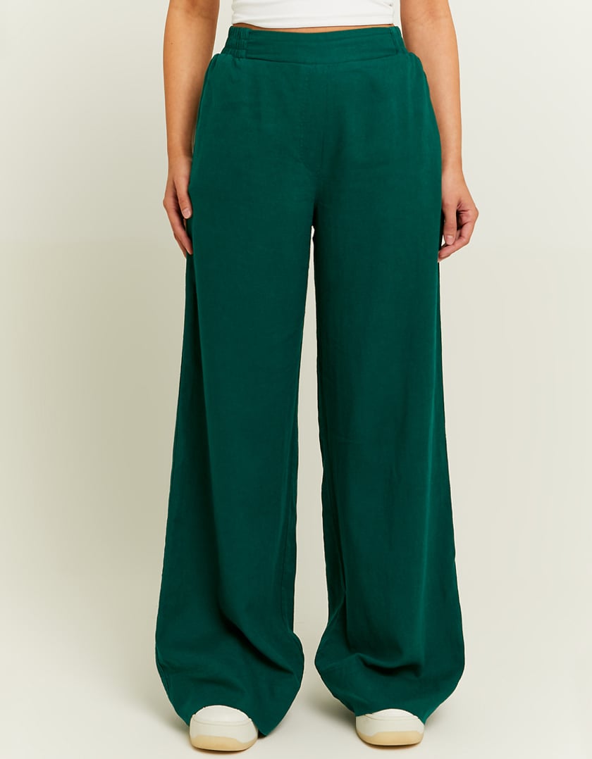 Leg detail of green wide leg linen pants