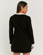 Back view of black cropped jumper
