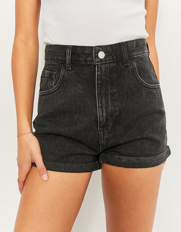 Front view of high waisted black mom denim shorts