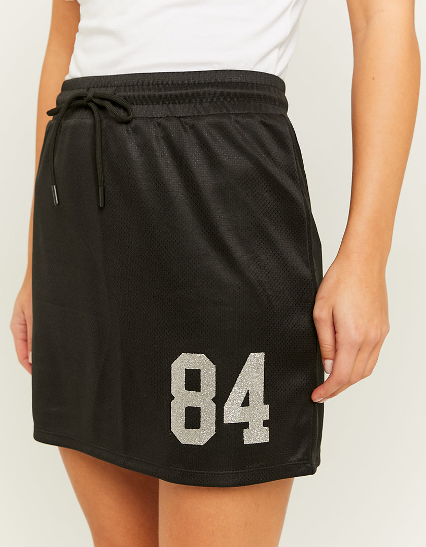 Ladies Black Varsity Mini Skirt-Model Side View