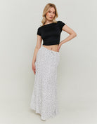 Full front view of black and white floral skirt