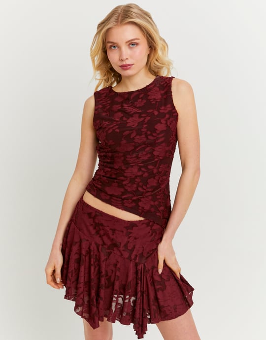 Tally Weijl burgundy floral top worn by model, front view