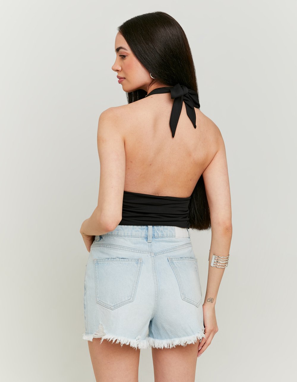 Ladies Black Crop Halter Top With Rhinestones-Model Back VIew