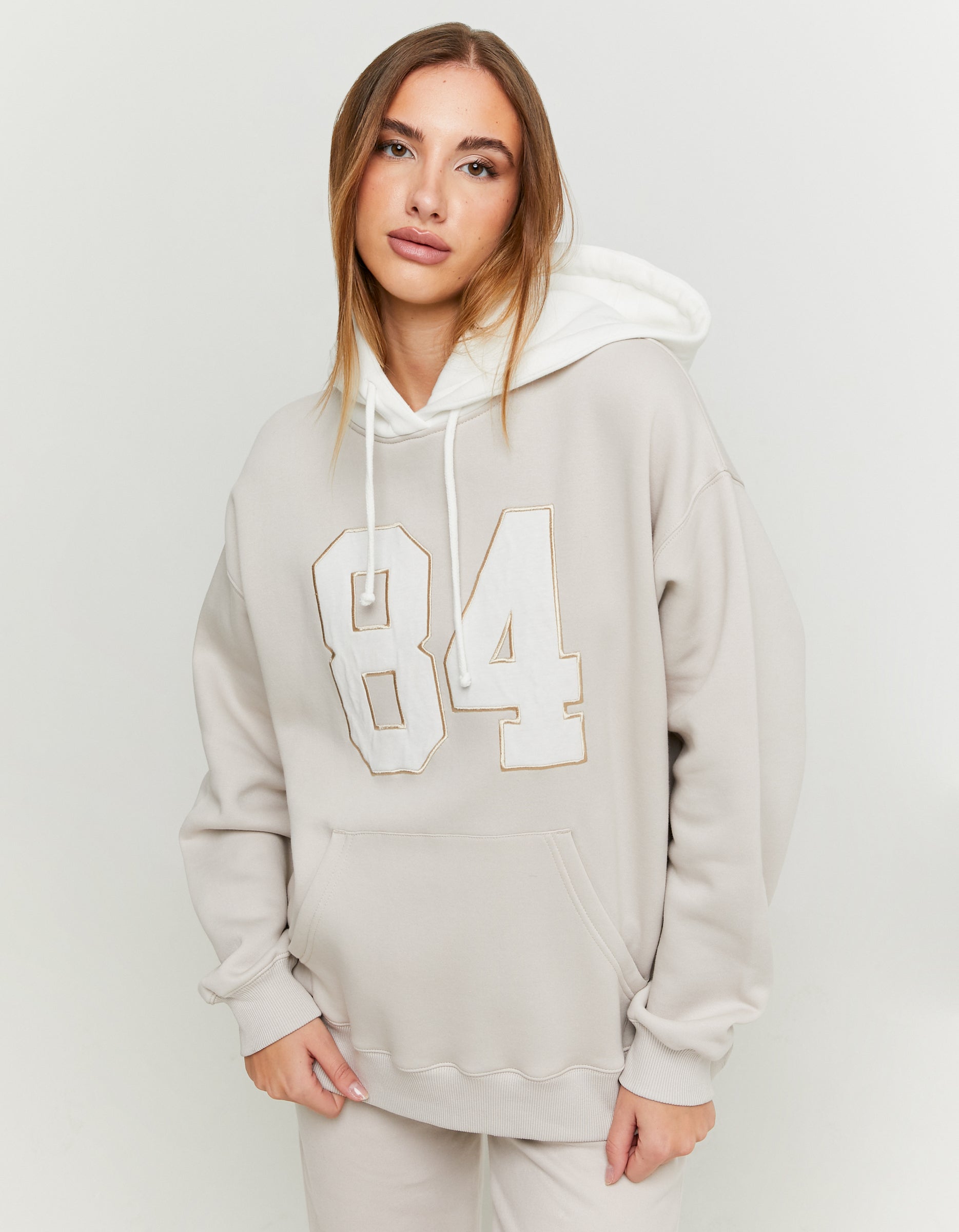 Ladies White/Beige Oversize Hoodie with Embroidery Patch-Model Front View