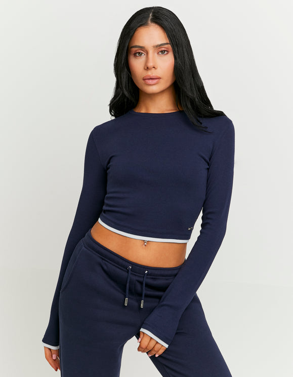 Tally Weijl basic blue long sleeve cropped T-shirt worn by model, front view