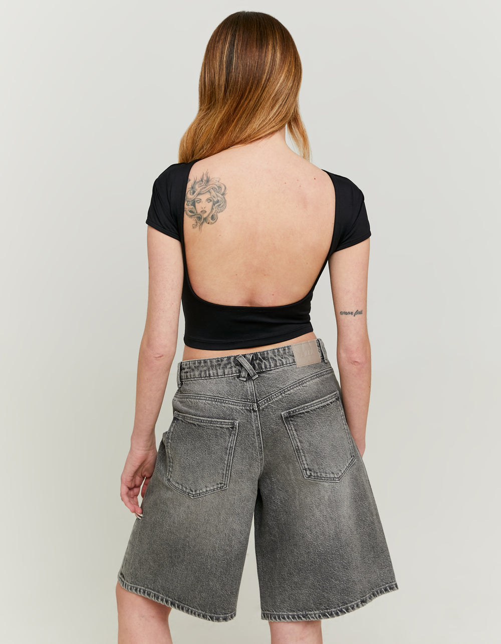 Ladies Black Blackless Basic Top--Model Back View