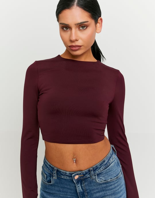 Tally Weijl basic burgundy long sleeve cropped T-shirt worn by model, front view