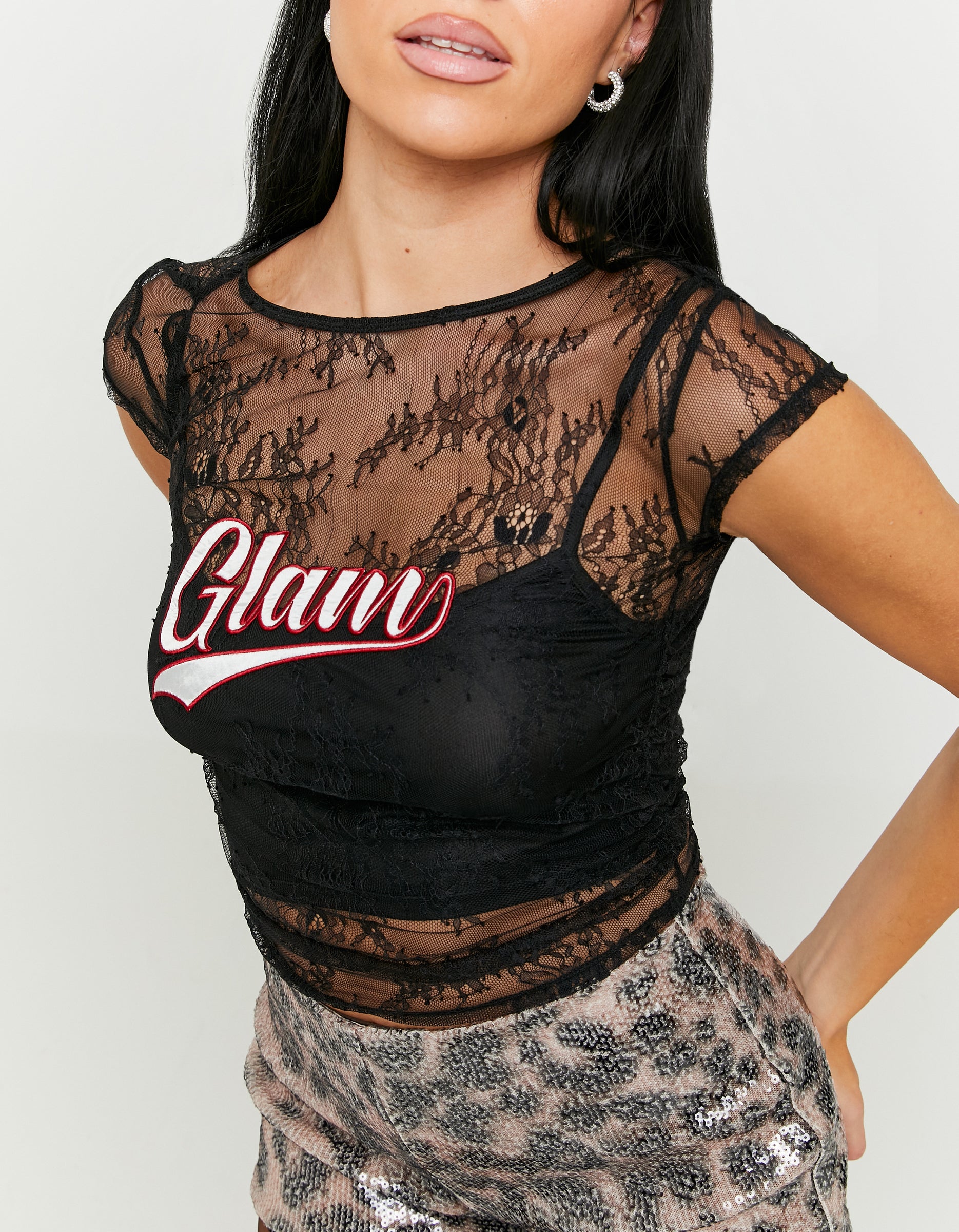 Ladies Black Fitted Lace Top With Patch-Closer View of Front