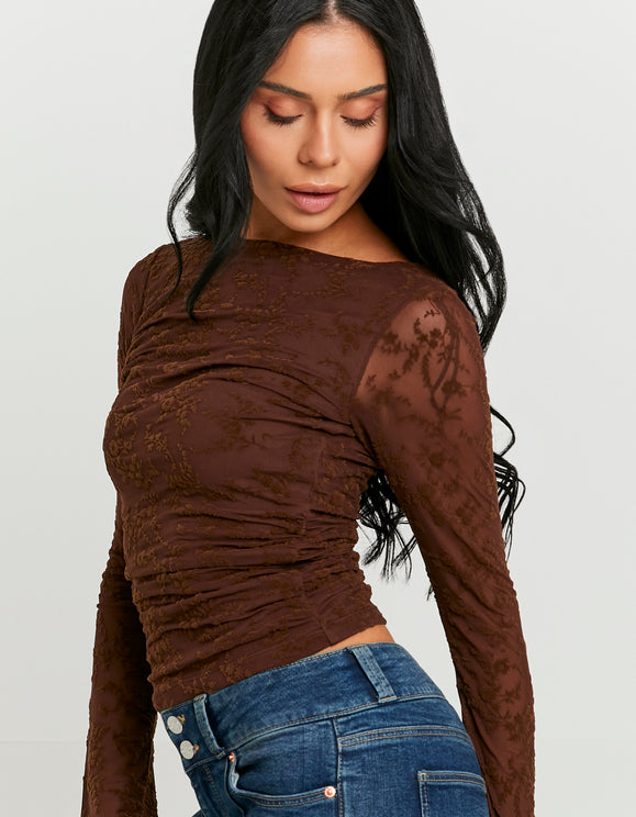 Tally Weijl brown floral top worn by model, side detail view