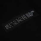 Black patch with 'SUPREMEBEING' text on a black background