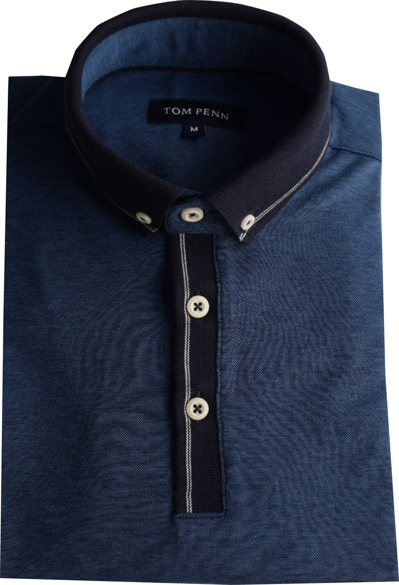 Blue polo shirt with a patterned collar and buttons, featuring the brand 'Tom Penn'.