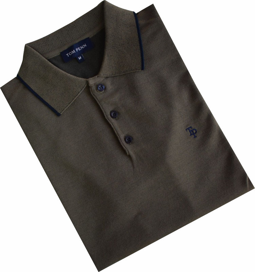Folded khaki green polo shirt with brand logo on a white background