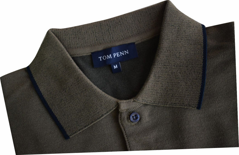 Khaki green polo shirt with a visible brand label on a white background