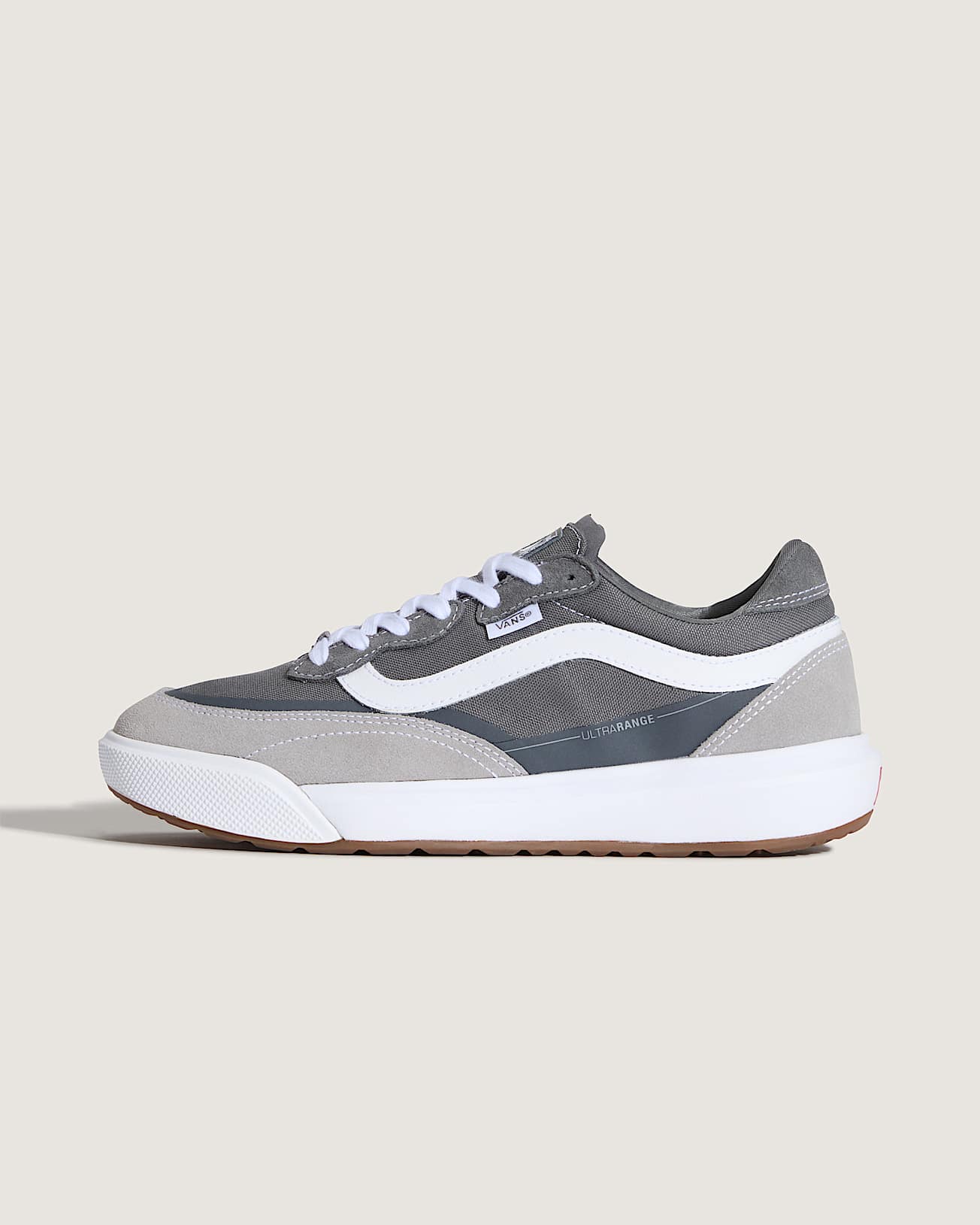 Gray and white sneaker on a light gray background