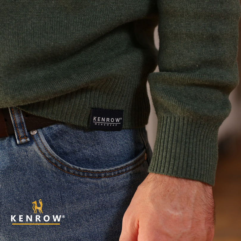 Man wearing a half-zip sage melange knit showing the cuff