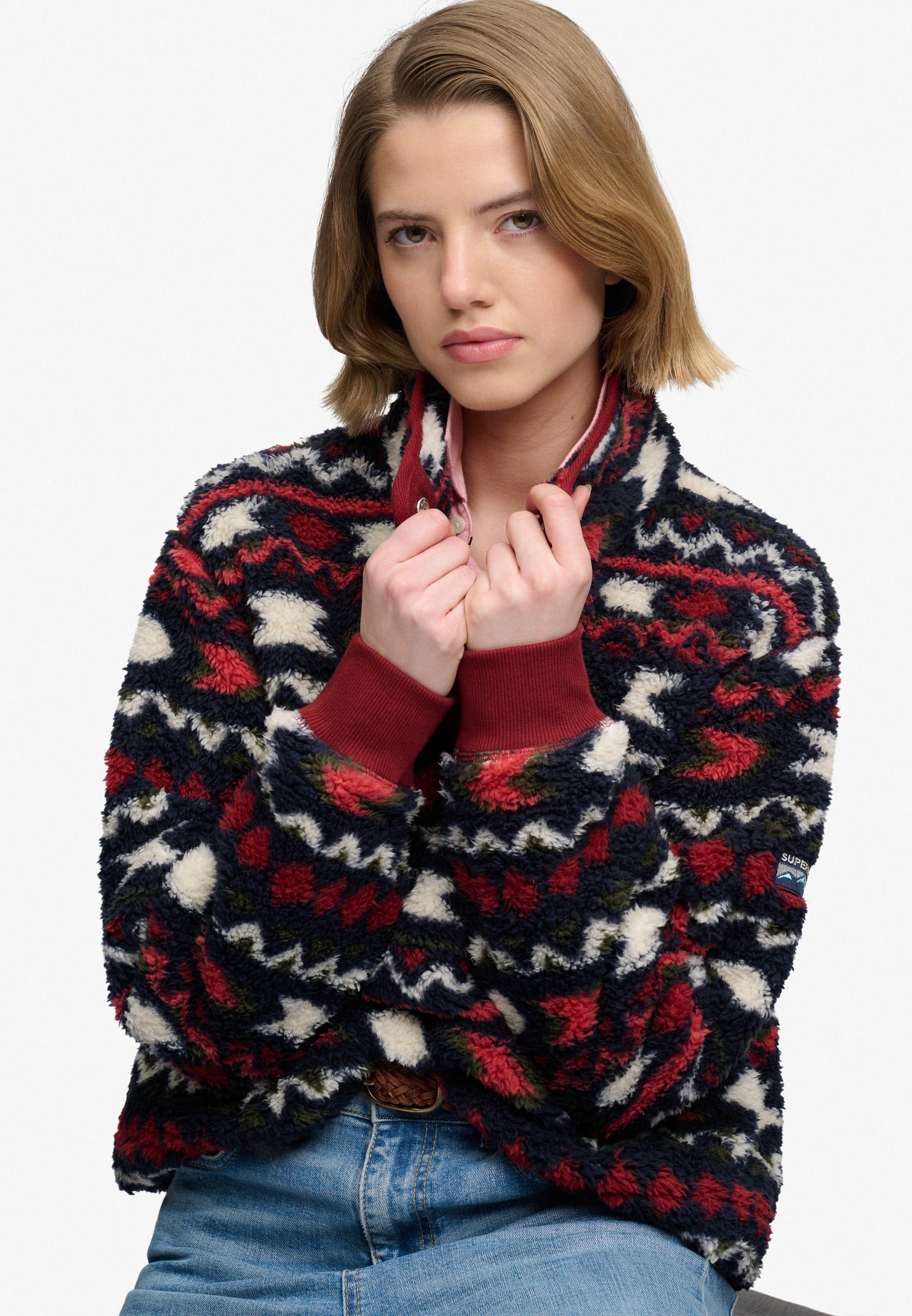 Superdry Super Soft Printed Half Button in Burgundy Mini Aztec seated view