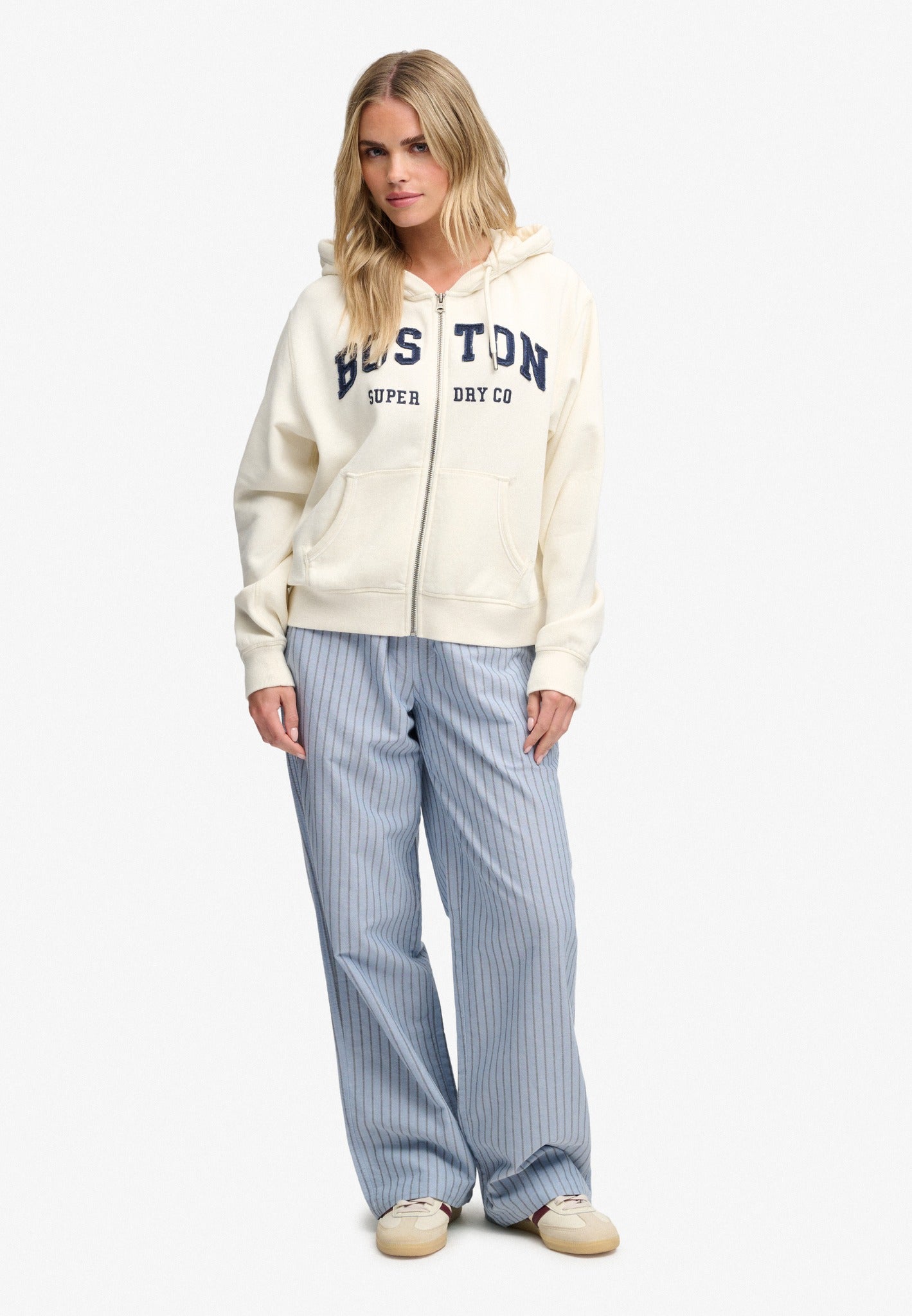 Superdry Ath Essential Relaxed Crop Ziphood in Desert Bone Off White full length view