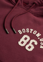 Superdry Ath Essential Applique Crop Hood in Port Red applique logo detail