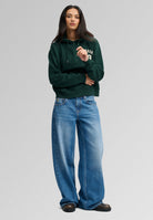 Superdry Ath Essential Applique Crop Hood in Enamel Green full length view