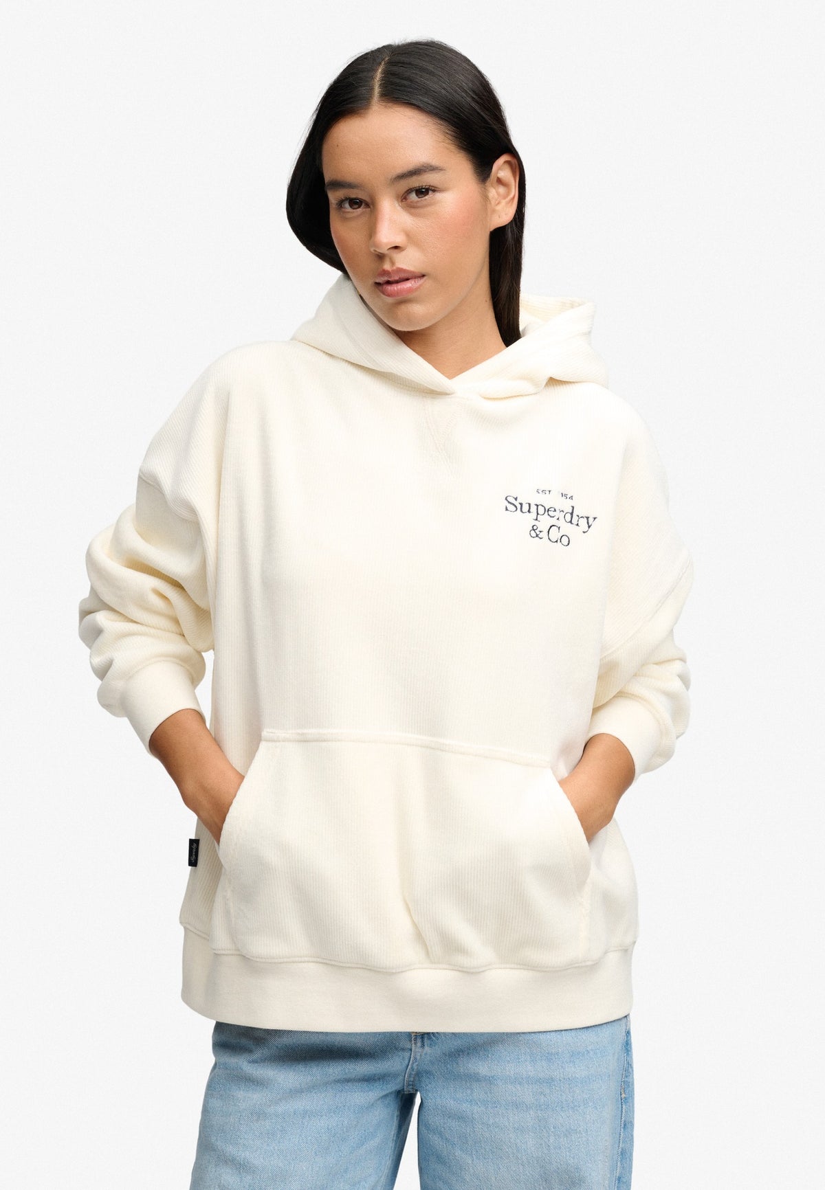 Superdry Drop Needle Velour Hoodie in Cream on model