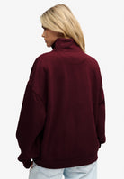 Superdry Monogram Half Zip Sweatshirt in Port Red back view on model