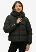 Superdry Hooded Sports Puffer Jacket in Black front model view