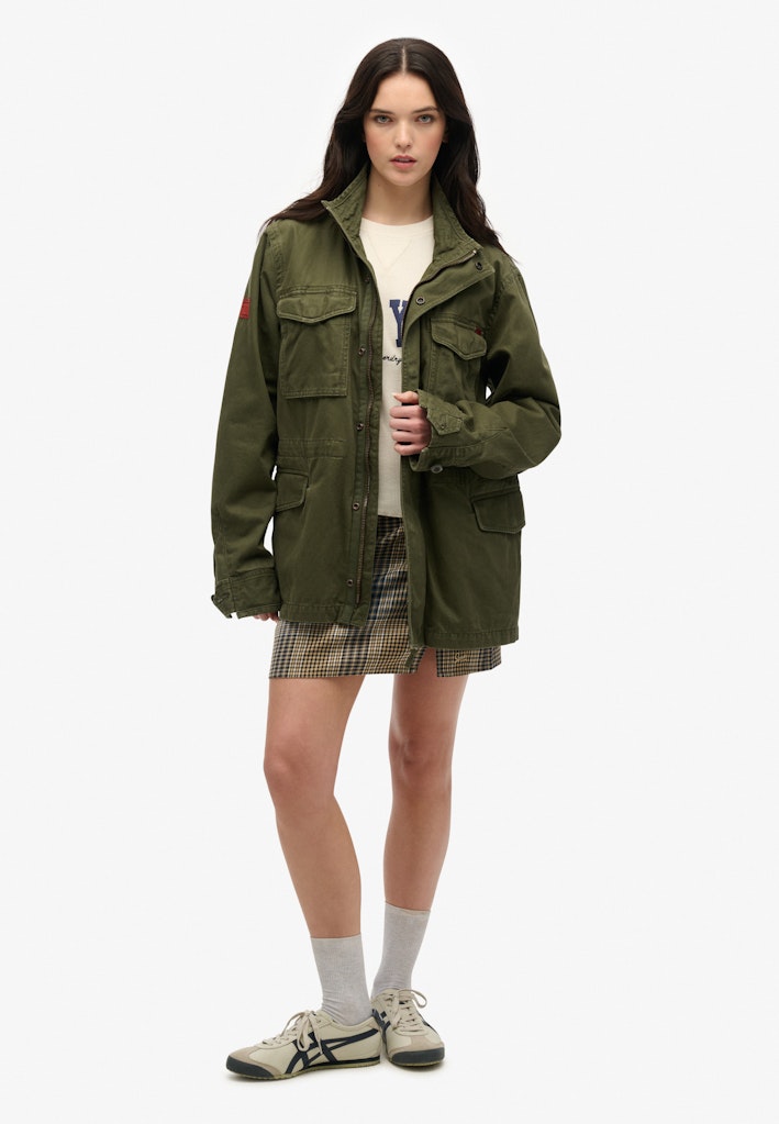 Superdry Ladies Ath Essential Graphic Ls Top Desert Bone Off White front view model wearing jacket