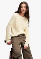 Superdry Slouchy Cable Knit in Natural White on model angled view