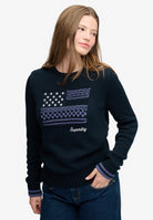 Superdry Statement Cable Flag Knit in Eclipse Navy angled view on model