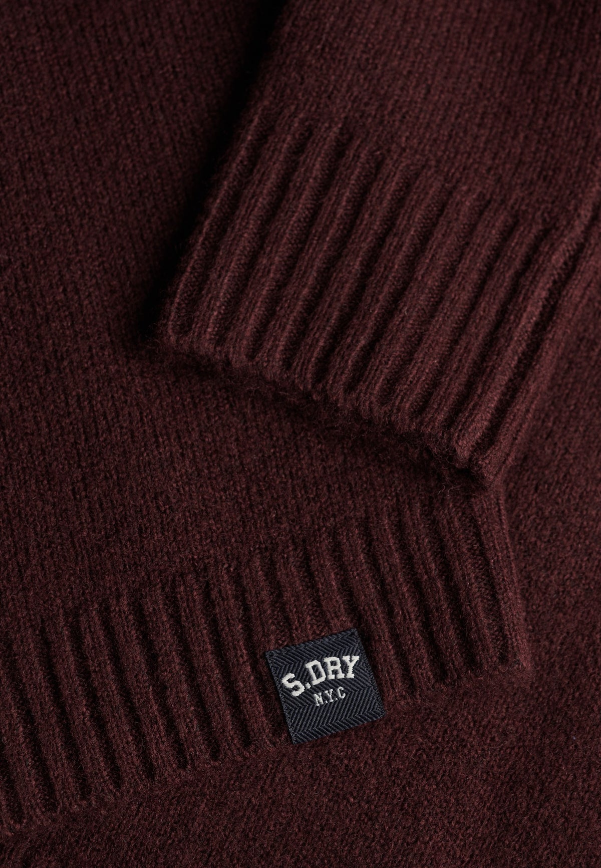 Superdry Bardot Knitted Jumper in Port Red collar and logo patch detail