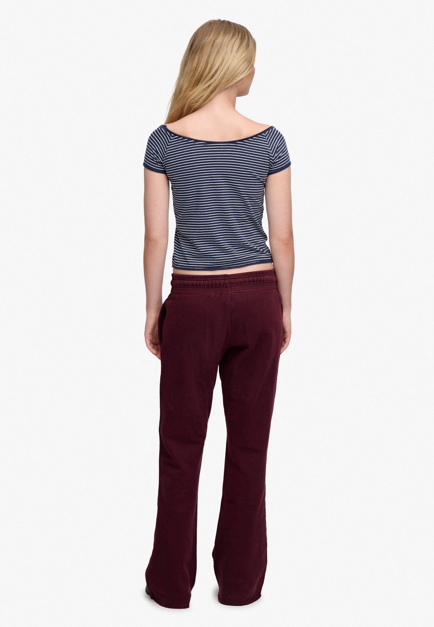 Superdry Athletic Embroidered Flare Jogger in Port Red angled view on model