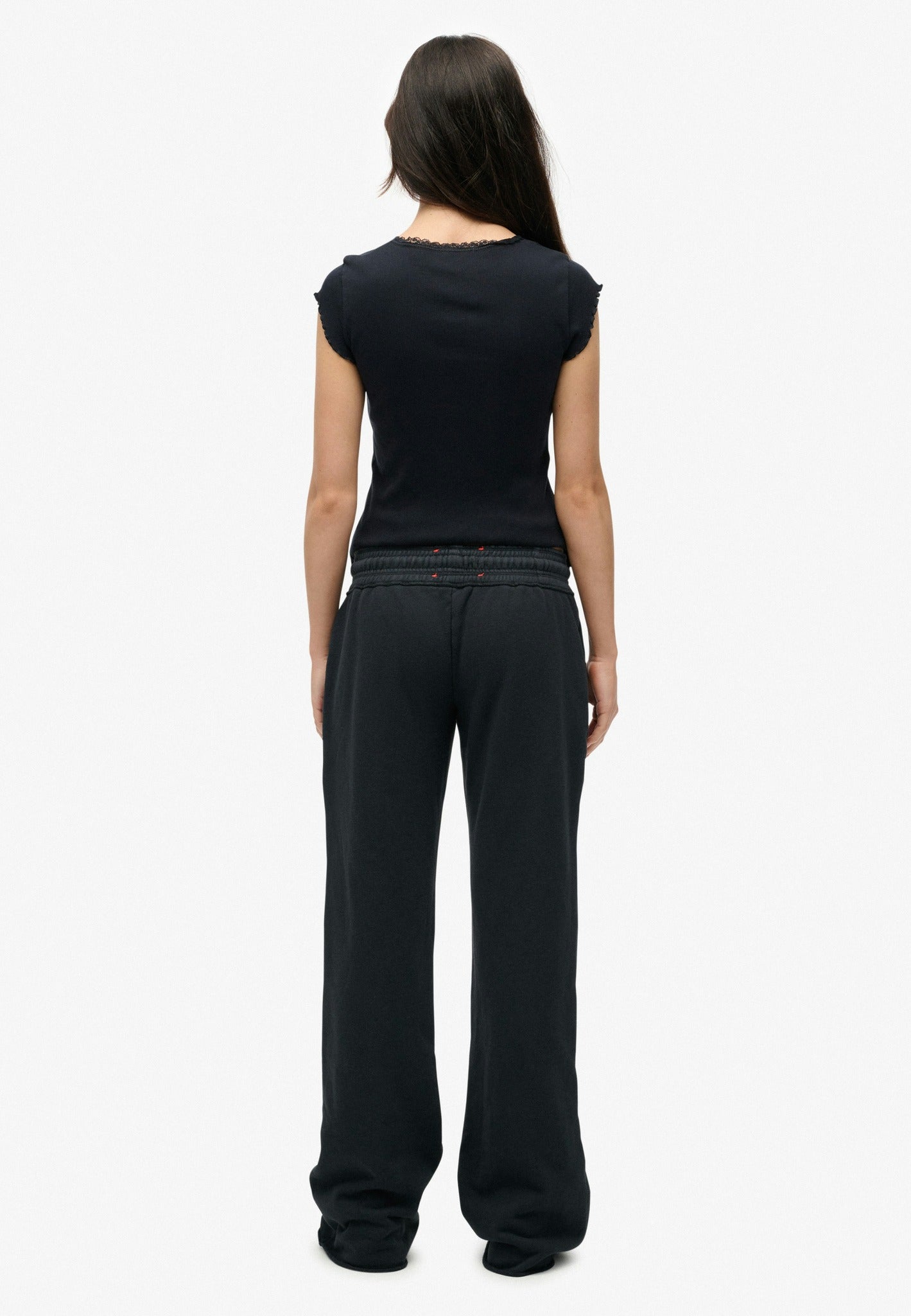 Superdry Athletic Print Flare Jogger in Eclipse Navy angled model view