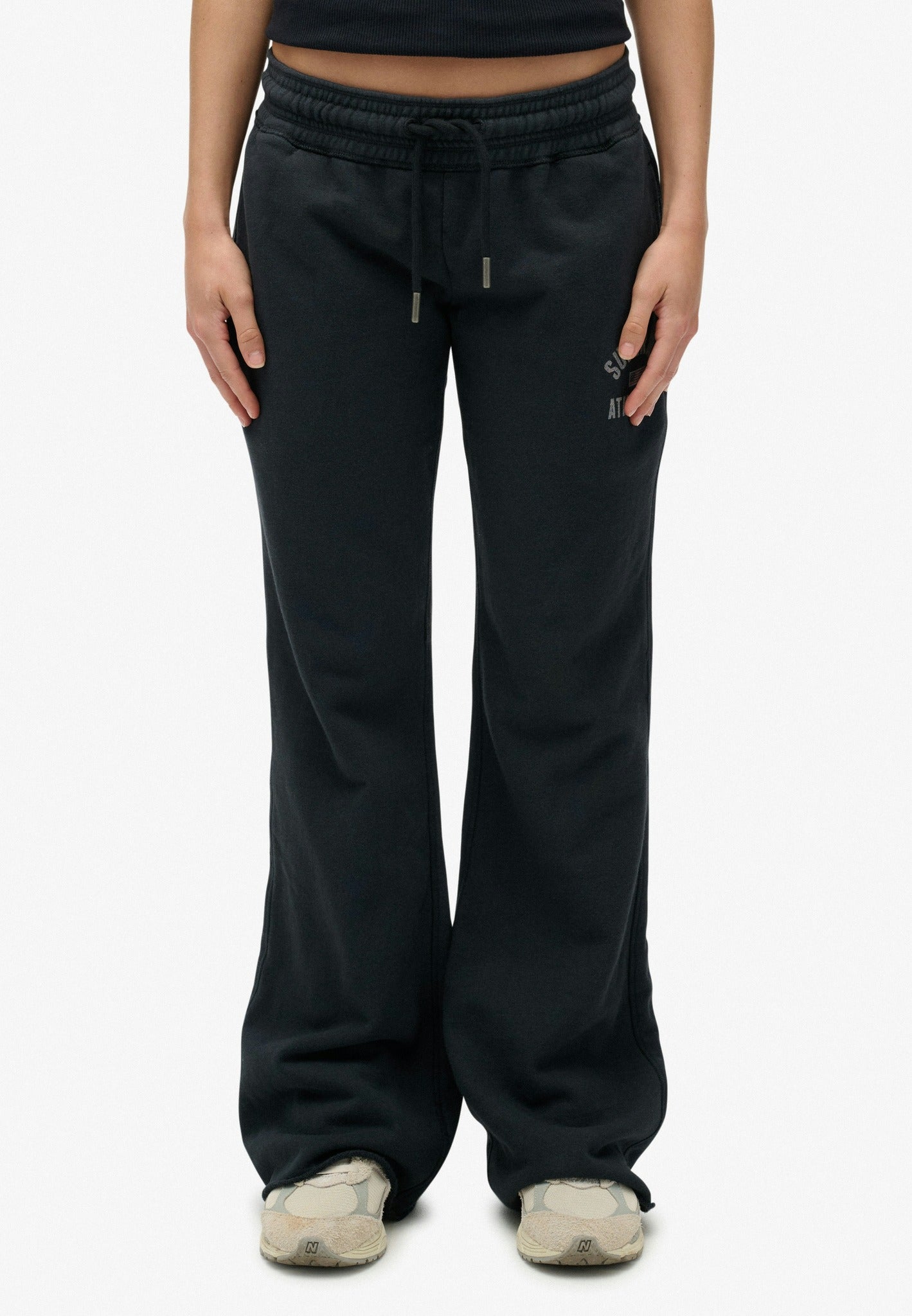 Superdry Athletic Print Flare Jogger in Eclipse Navy angled model view