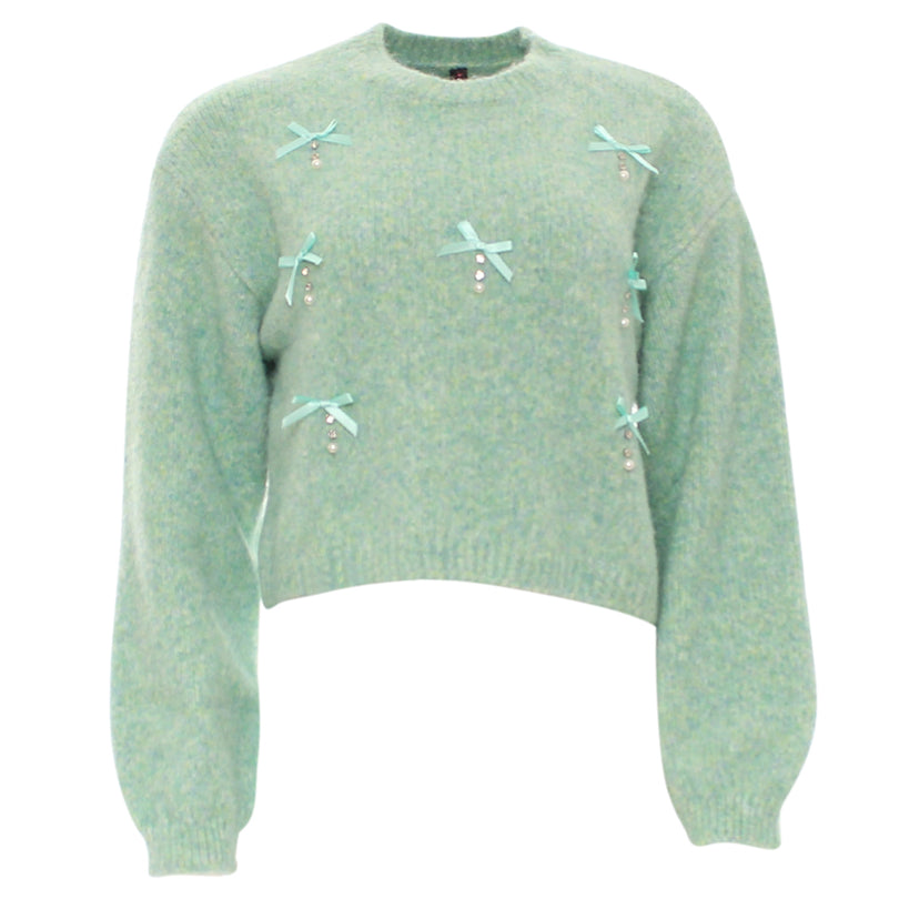 Light green sweater with decorative elements on a white background