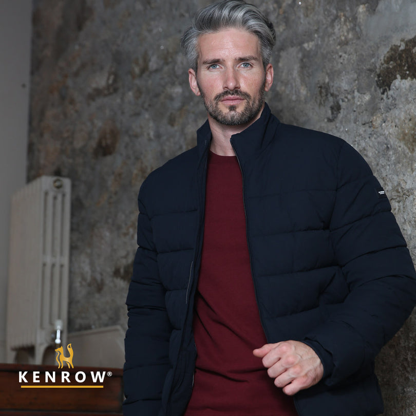 Man wearing navy puffer jacket