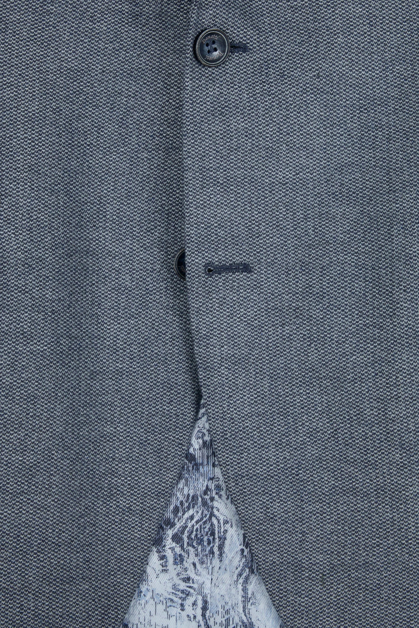Texture and buttons on the Pisa Navy blazer front closure