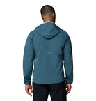 Person wearing a blue jacket on a white background