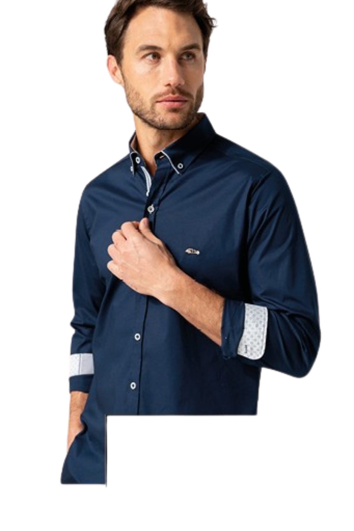 Man wearing a navy blue shirt with white accents on a white background