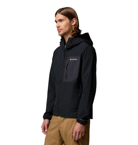 Person wearing a black Columbia jacket on a white background