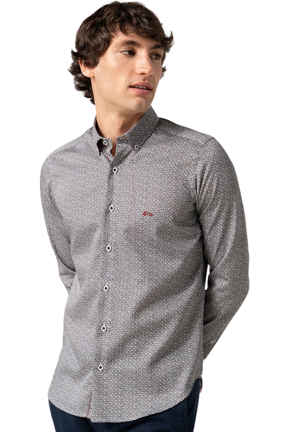 Man wearing a patterned burgundy and navy shirt on a white background