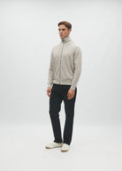 Diesel Darwin Full Zip cardigan in Beachcomber, three-quarter model view with the collar zipped up.