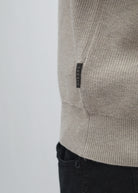 Diesel Darwin Full Zip cardigan in Beachcomber, close-up of the ribbed knit and Diesel side-hem label.