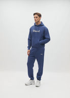 Diesel Walt Hoodie in Hugo Blue, three-quarter model view with hands in the front pocket.