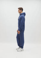 Diesel Walt Hoodie in Hugo Blue, side model view showing the hood and sleeve.