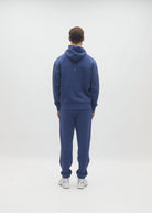 Diesel Walt Hoodie in Hugo Blue, back model view showing the hood and small upper-back motif.
